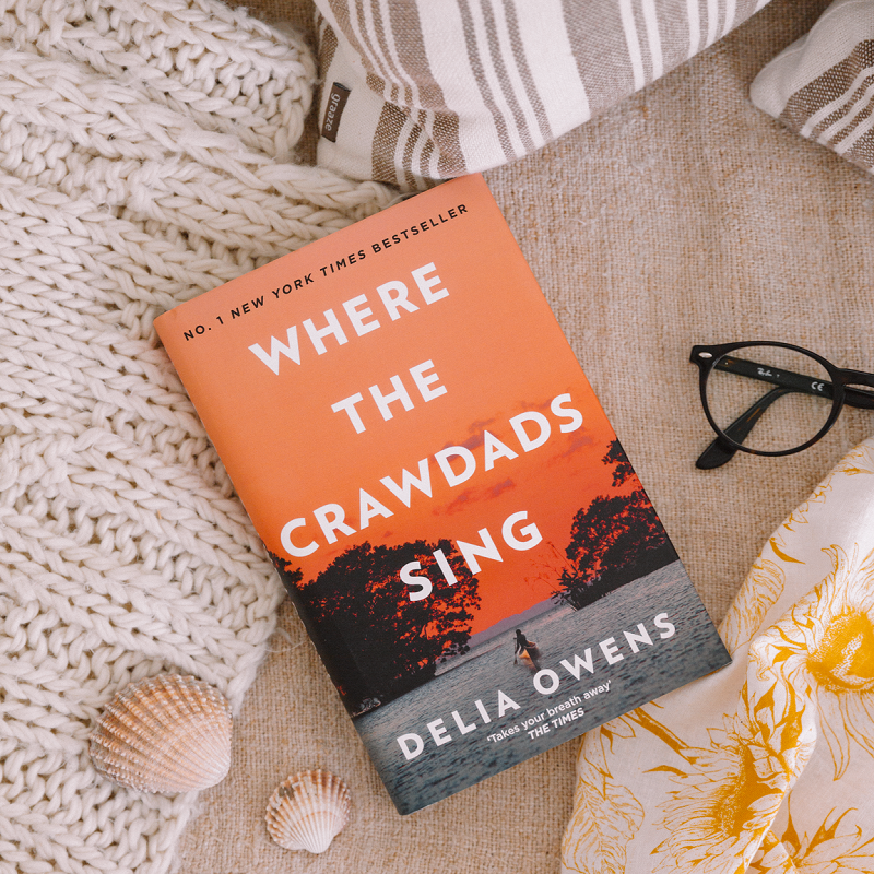 Where the Crawdads Sing Book Sitting on a blanket